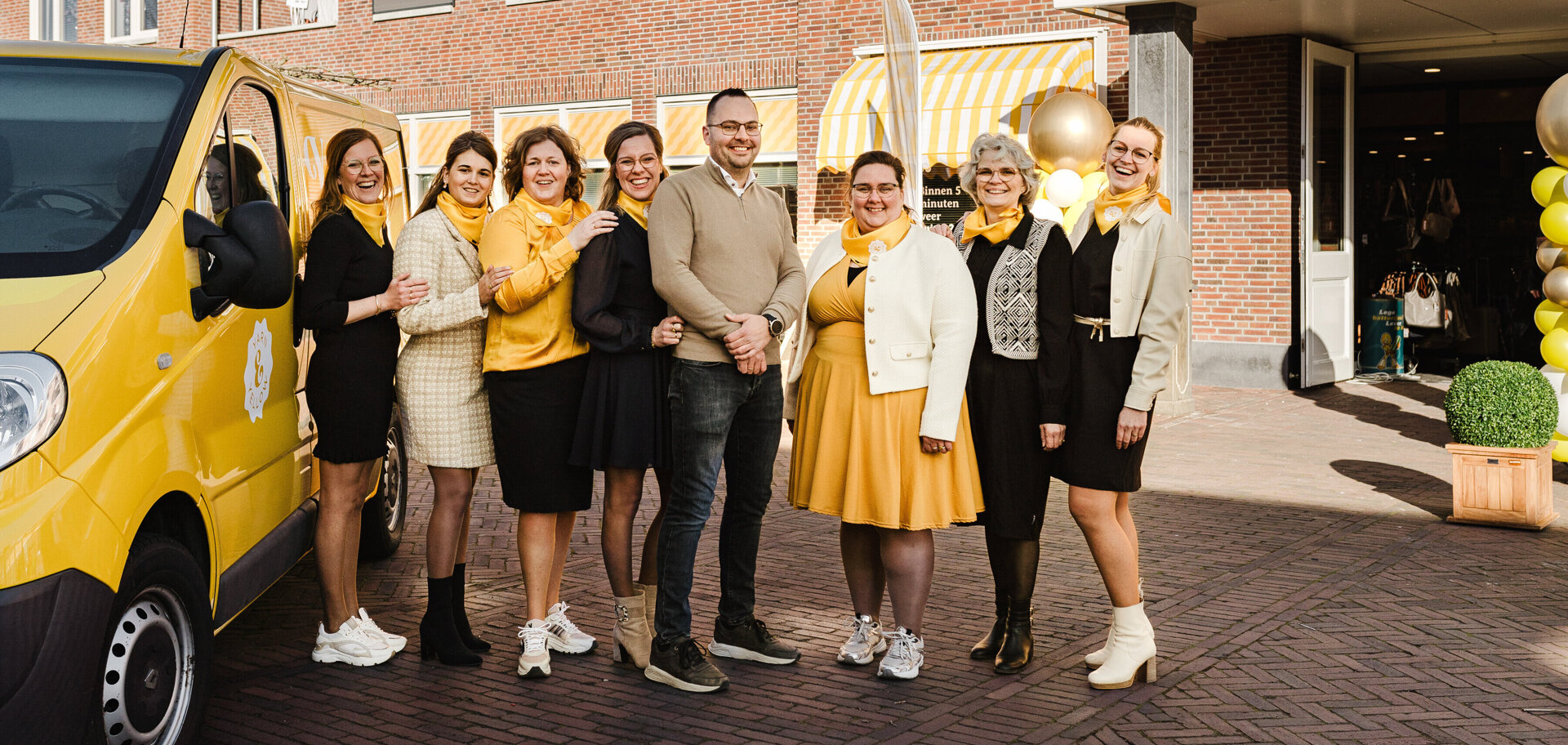 Team voor Winkel met Bus